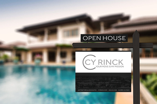 Open house sign in front of a luxury home with a pool.