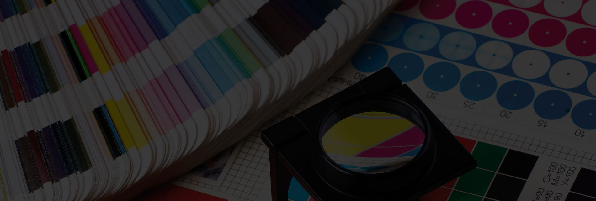Color swatches and a magnifier for print quality checking.