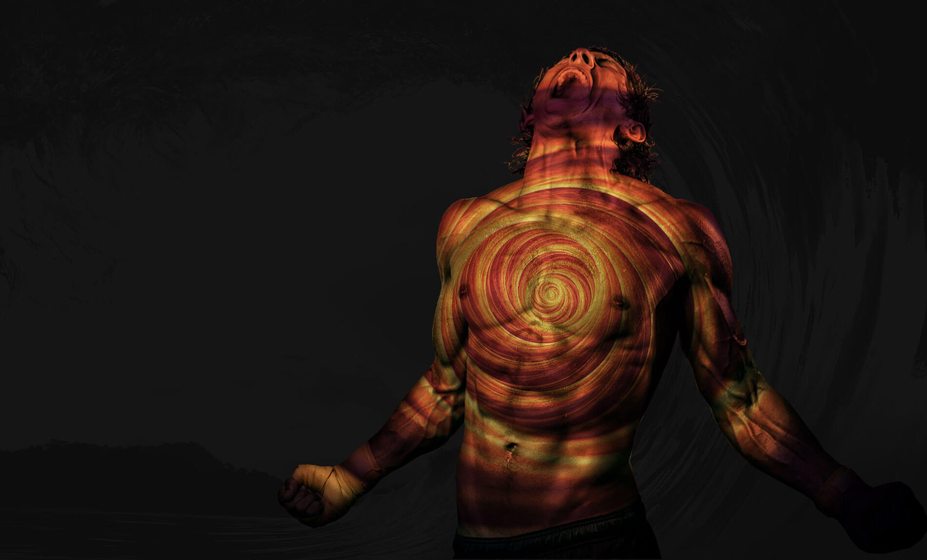 Man with spiral pattern on chest, screaming.