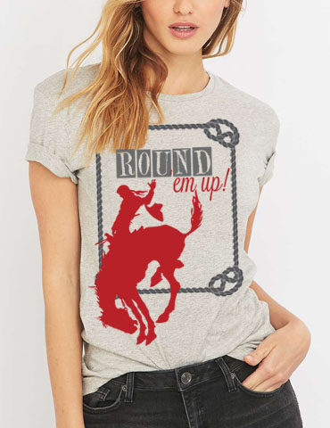 T-shirt with a cowboy and horse graphic saying 'Round em up!'