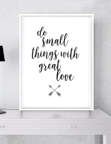 Inspirational wall art with the quote about doing small things with great love.