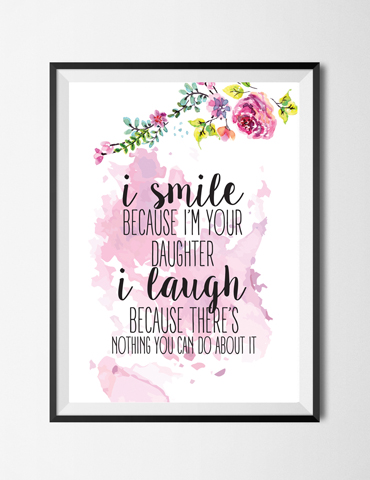 A framed floral quote about a daughter's smile and laugh.