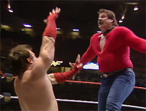 Wrestlers in action during a match.